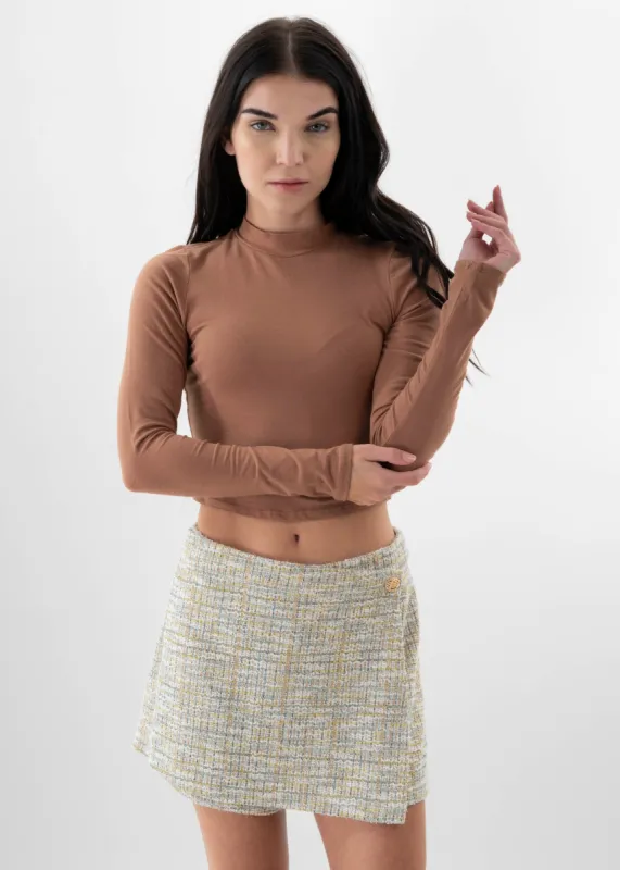 Blusa manga larga cuello alto sold by Shasa