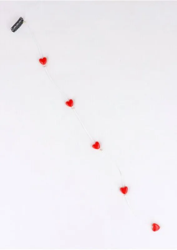 Broche mini colgante corazones sold by Shasa