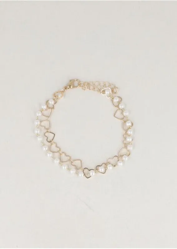 Pulsera 2 Líneas Perlitas Corazón sold by Shasa