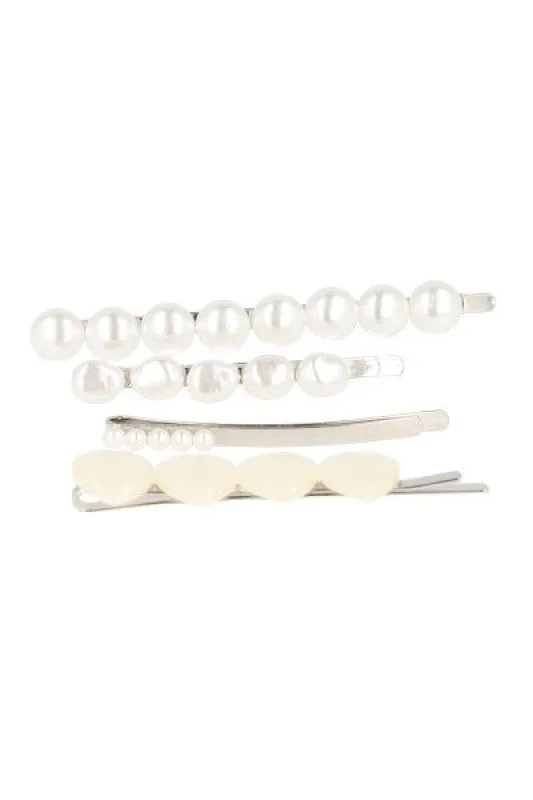 Set 4 pasadores perlas sold by Shasa
