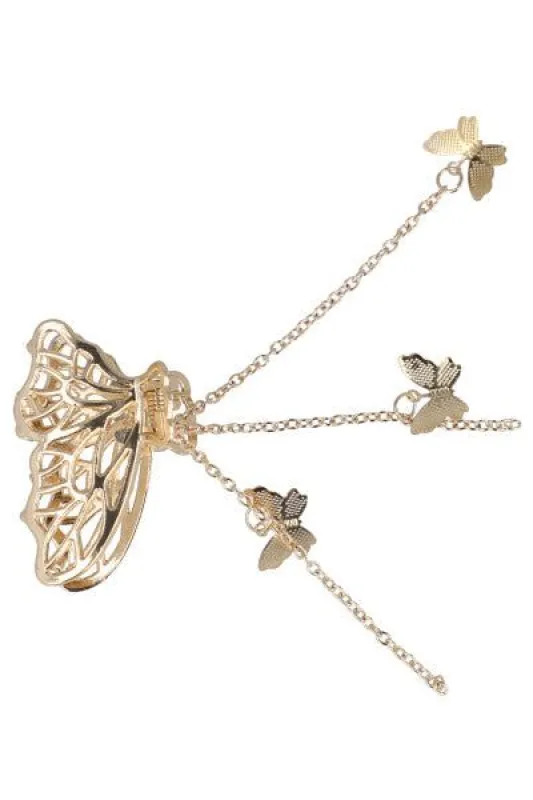 Pinza metálica mariposa colgantes sold by Shasa