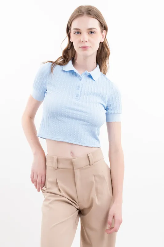 Top textura cuello polo sold by Shasa