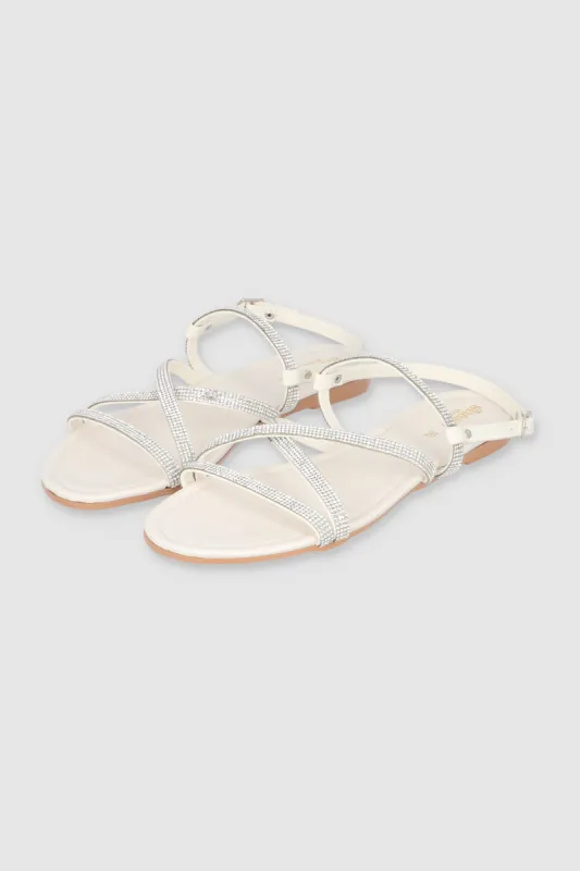 Sandalia Tiras Brillos Cruzadas sold by Shasa