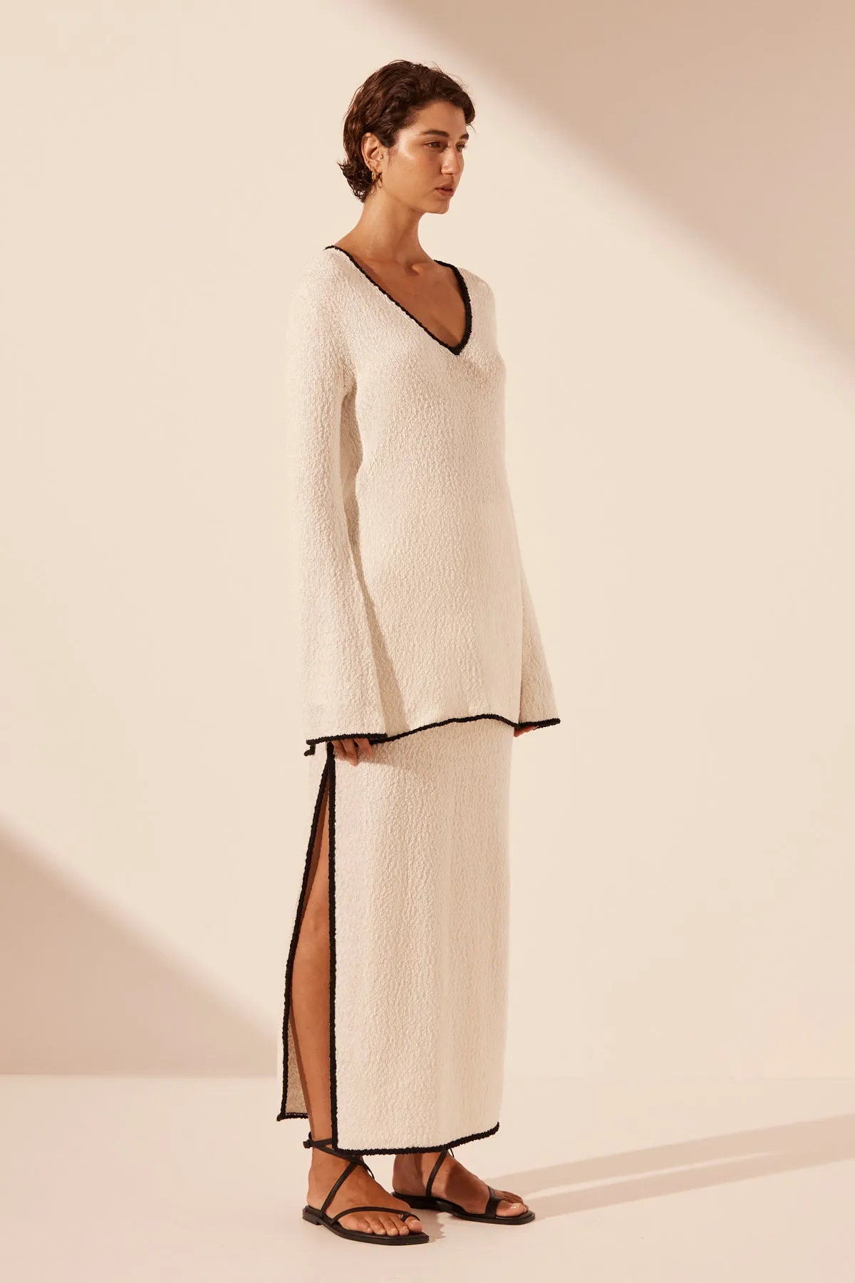 LENA PLUNGED LONG SLEEVE TOP - IVORY/BLACK sold by Shona Joy