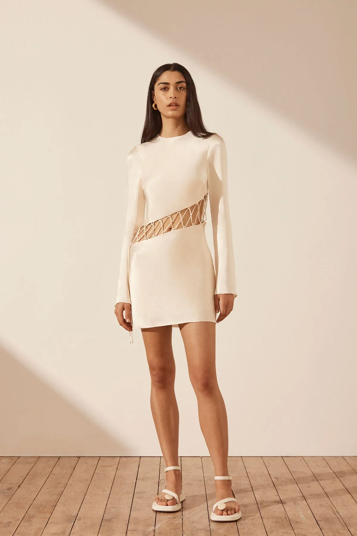 ARIENZO ASYMMETRICAL LACE UP MINI DRESS - CREAM sold by Shona Joy