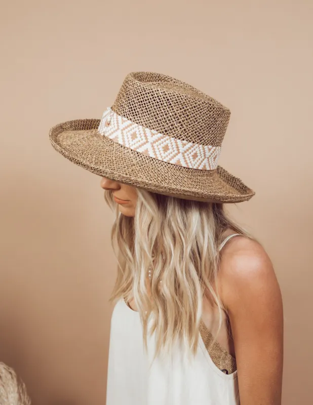 Dori  Seagrass Hat sold by Shop Stevie
