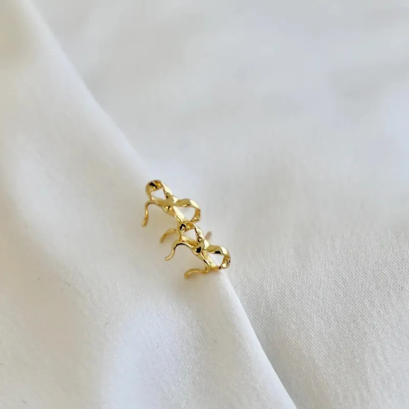 Golden Bow Studs sold by Shop Stevie