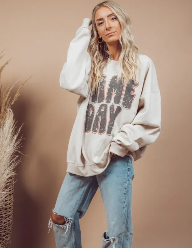 Game Day Oversized Graphic Sweatshirt sold by Shop Stevie