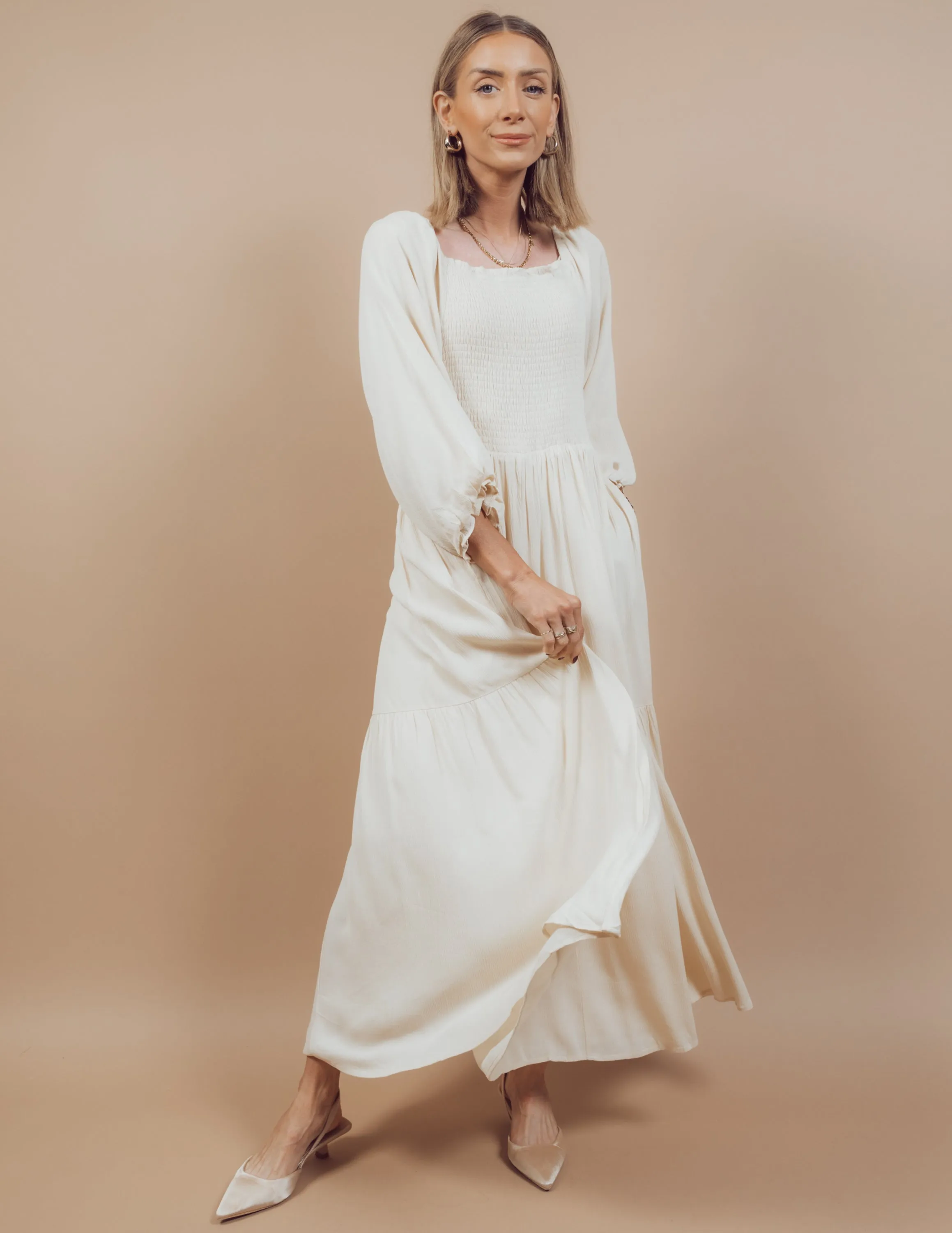 Evelyn Smocked Dress in Cream sold by Shop Stevie product image thumbnail 2