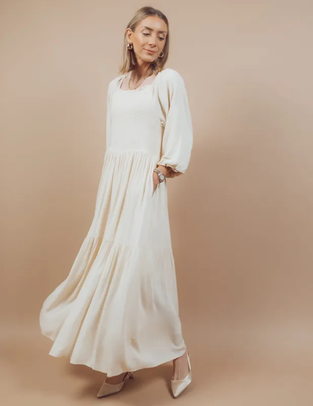 Evelyn Smocked Dress in Cream sold by Shop Stevie