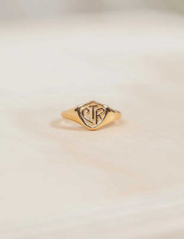 CTR Ring in Gold sold by Shop Stevie