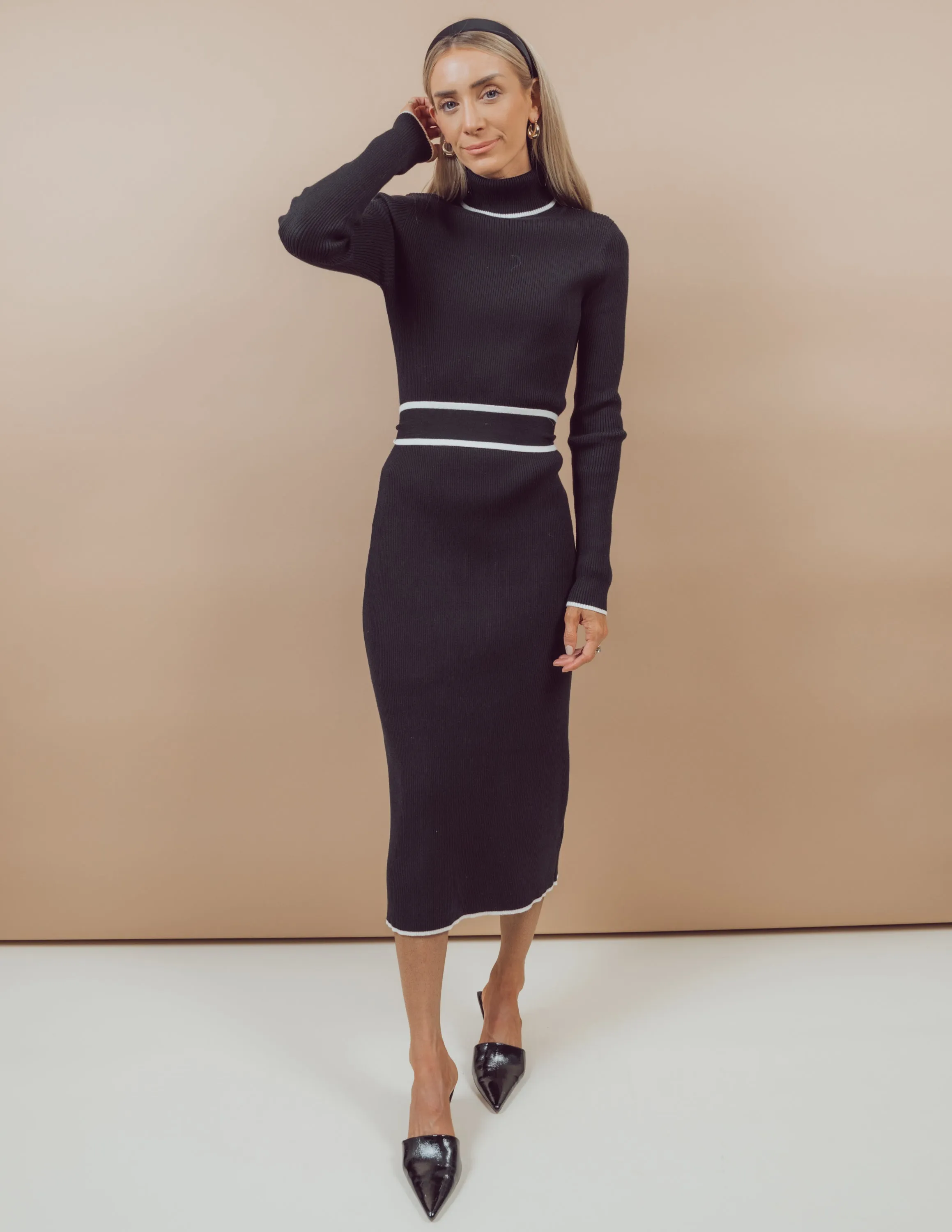 Arnett Midi Dress sold by Shop Stevie