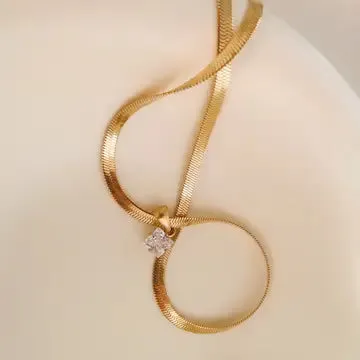 Gold Snake Herringbone Pendant Necklace sold by Shop Stevie