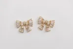 Gold Maxi Sparkler Statement Stud Bow Earrings sold by Shop Stevie