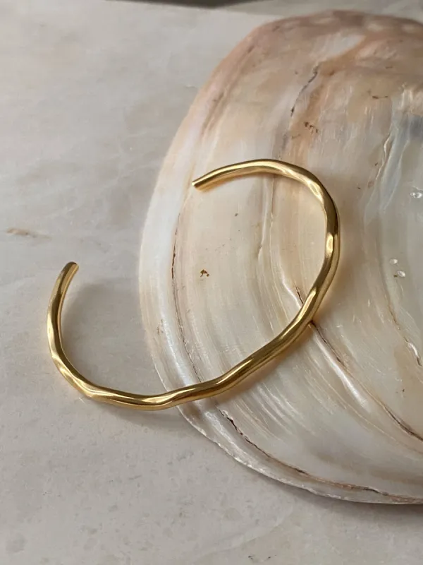 Wavy Bangle sold by Shop Stevie
