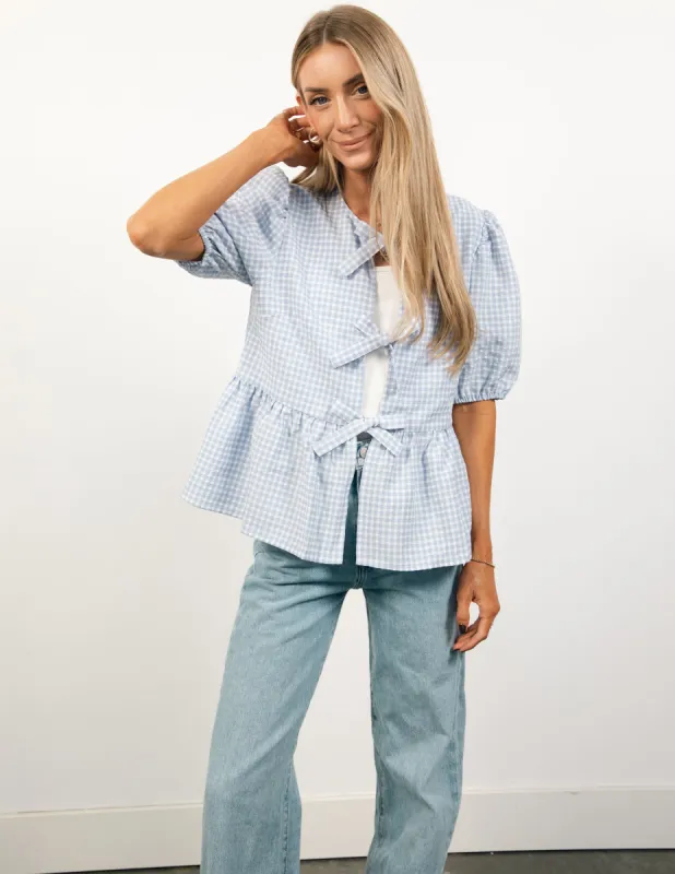 Peplum Gingham Tie Front Top sold by Shop Stevie
