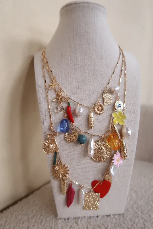 Three-Strand Charm Necklace sold by Shop Stevie