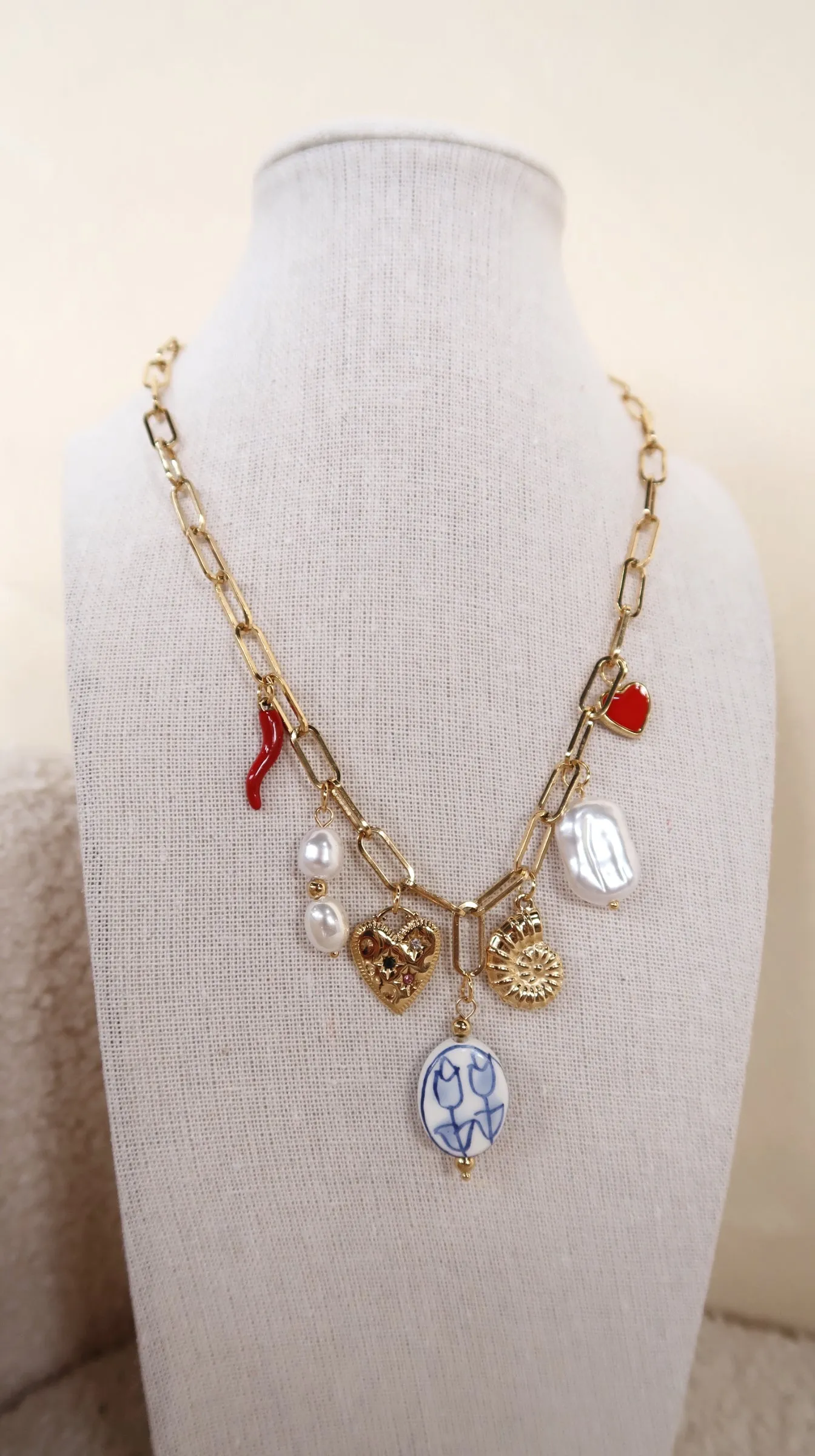 Blue and White Floral Charm Necklace sold by Shop Stevie