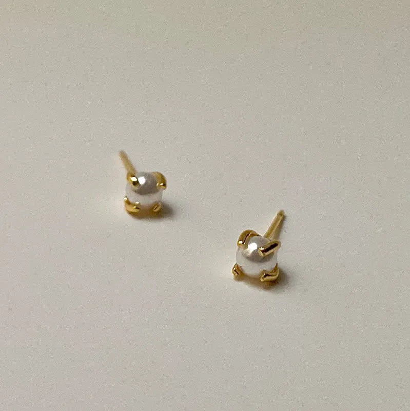 Pearl Studs sold by Shop Stevie