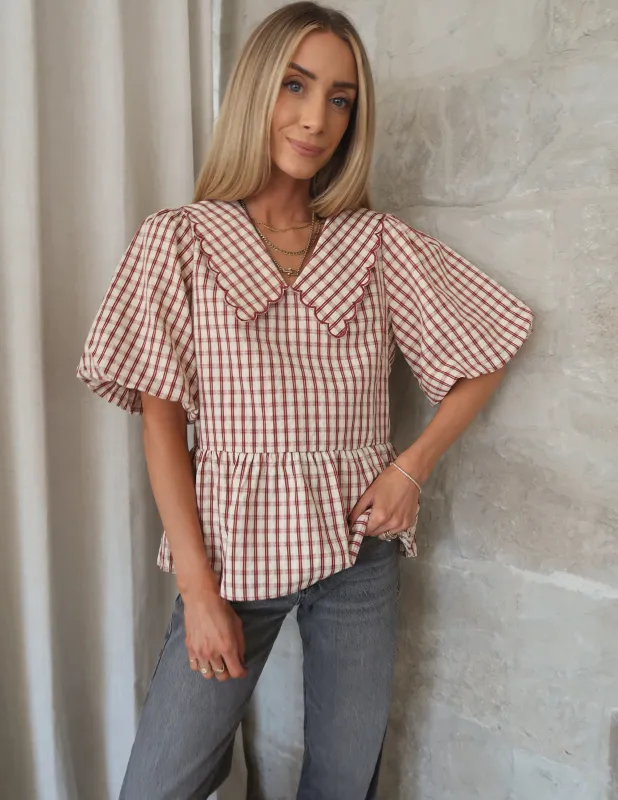 Macy Peplum Top sold by Shop Stevie