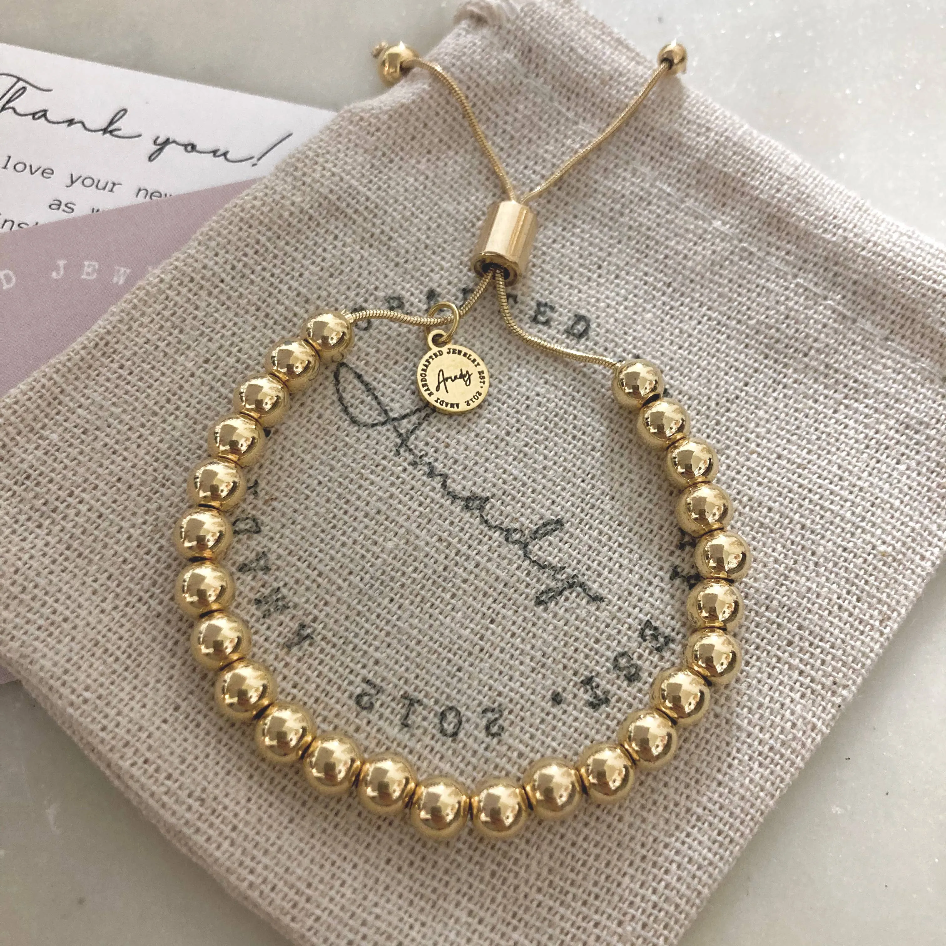 Cherish Beaded Gold Bracelet sold by Shop Stevie