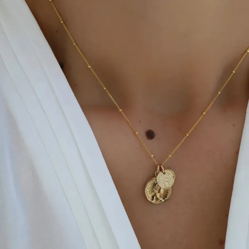 Coin Charm Necklace sold by Shop Stevie
