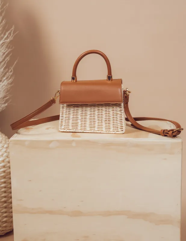 Lin Woven Straw Purse sold by Shop Stevie