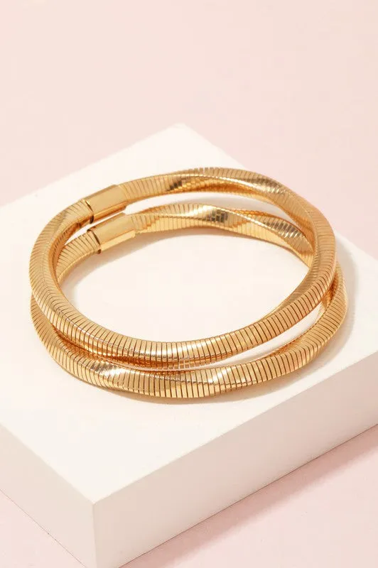 Metallic Square Coil Bracelet sold by Shop Stevie