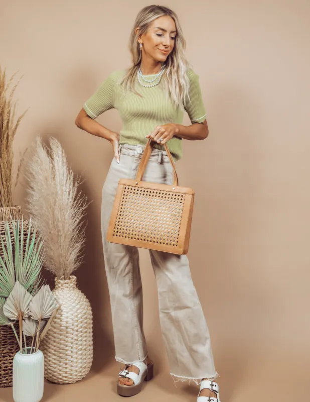 Dax Rattan Purse sold by Shop Stevie