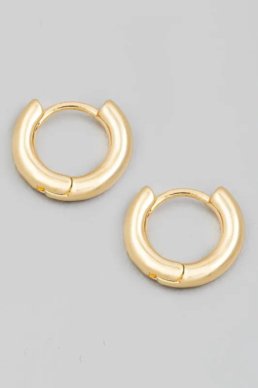 Mini Circle Huggie Earrings sold by Shop Stevie