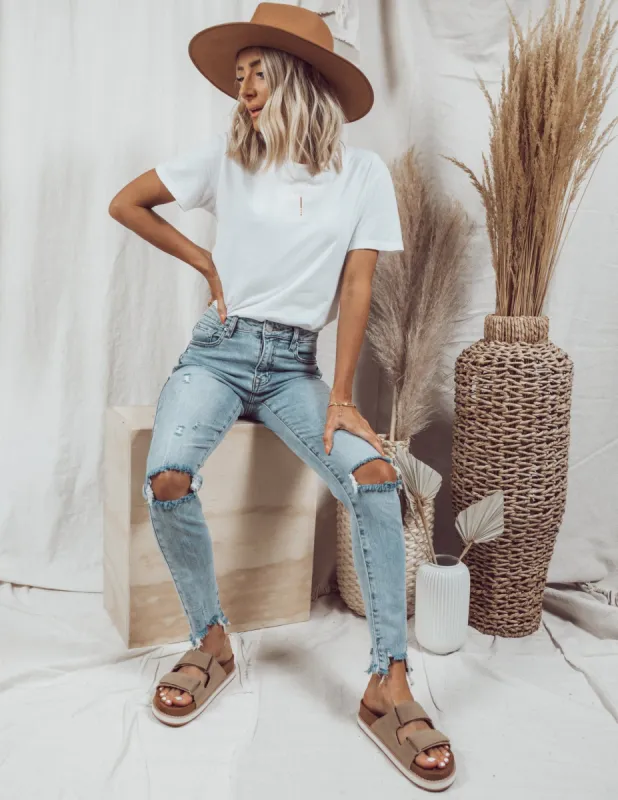 Luna Distressed Skinny Jeans sold by Shop Stevie