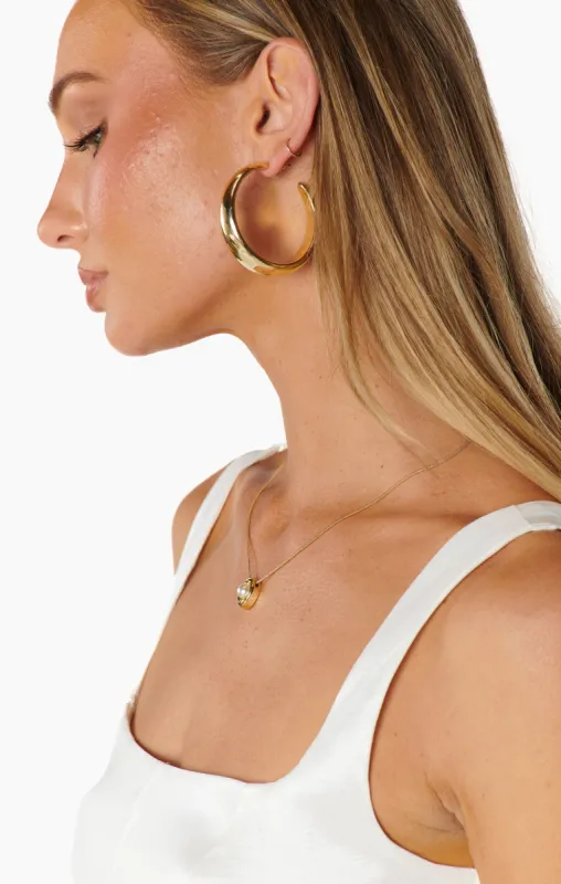 Curved Hoop Earrings ~ Gold sold by Show Me Your MuMu