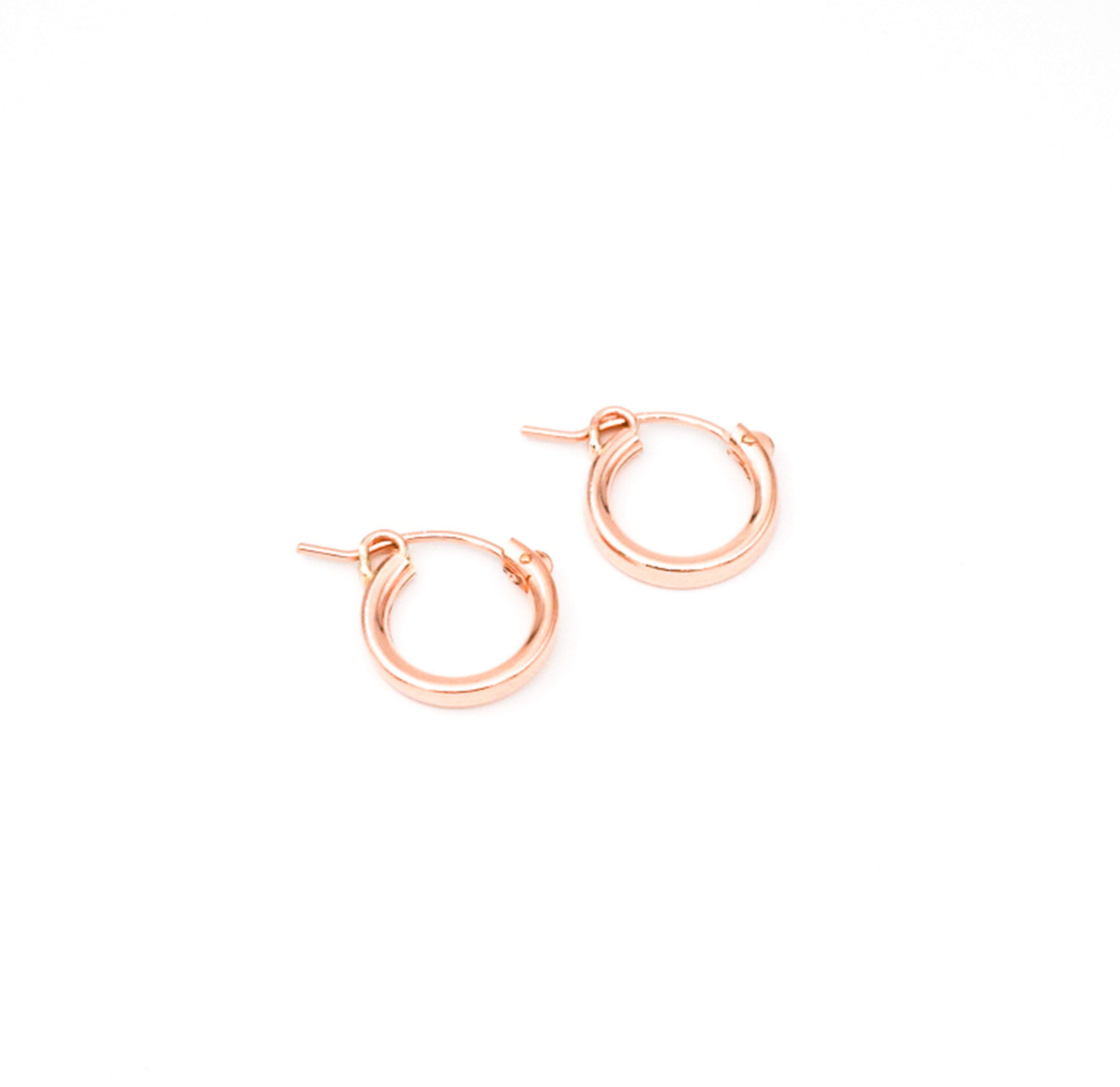 Rose Gold Hinge Hoops sold by Sienna Sky