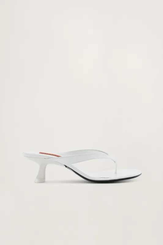 Beep Thong In White Patent made by Simon Miller