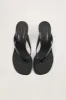 Beep Thong In Black Patent sold by Simon Miller