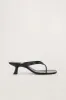 Beep Thong In Black Patent sold by Simon Miller