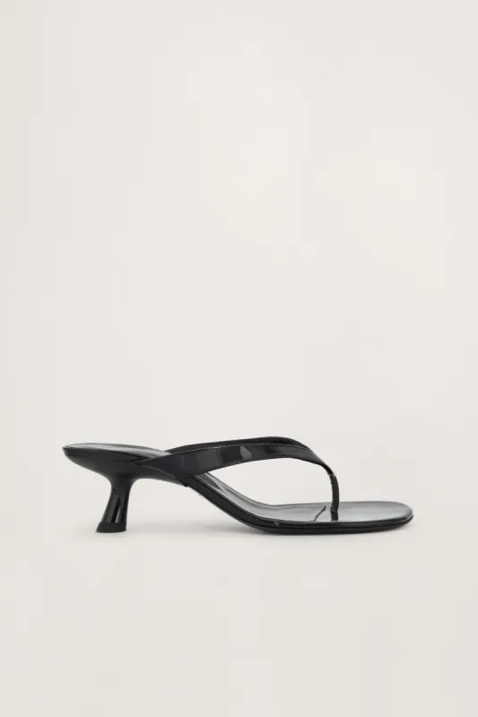 Beep Thong In Black Patent sold by Simon Miller