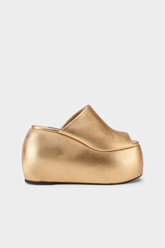 Bubble Wedge in Star Gold sold by Simon Miller