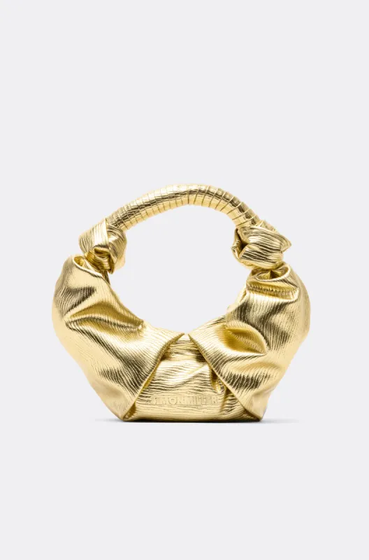 Lopsy Bag in Textured Star Gold sold by Simon Miller
