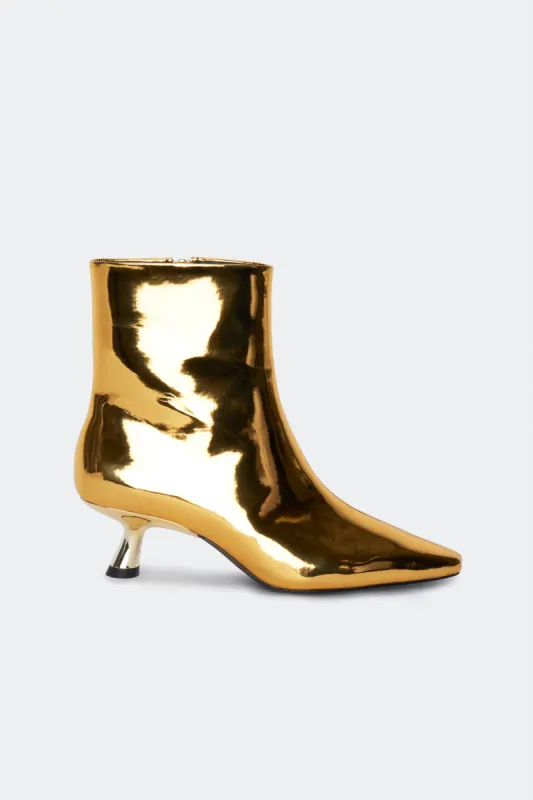 Chrome Kuki Boot in Star Gold sold by Simon Miller