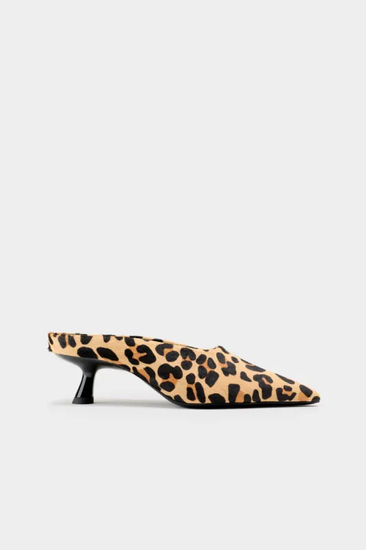 Haircalf Pointed Gala Mule in Cheetah sold by Simon Miller