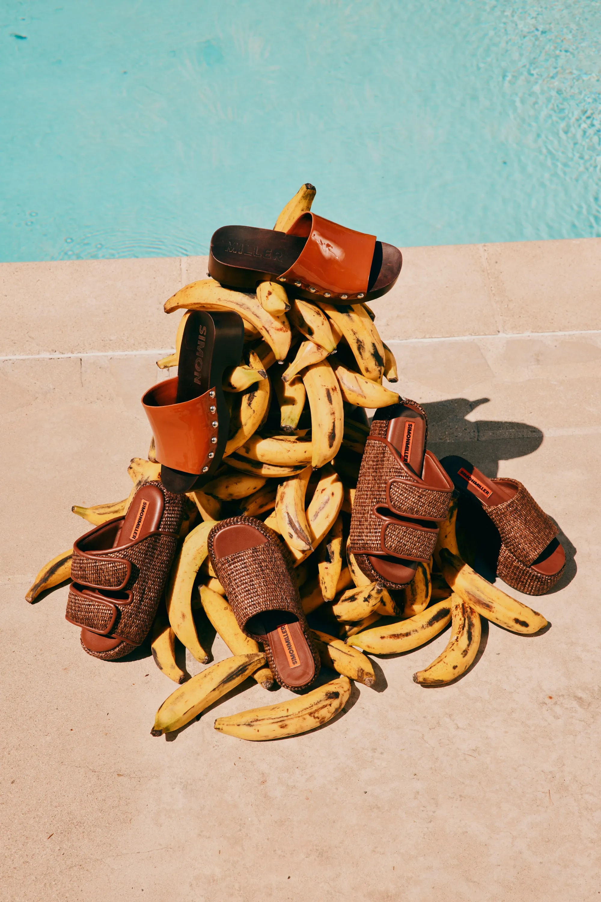 Raffia Cro Slide In Chocolate sold by Simon Miller