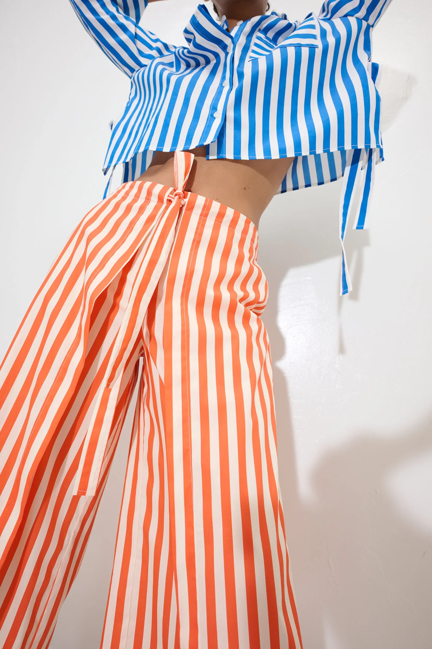 Lima Poplin Pant in Coral Cabana Stripe sold by Simon Miller