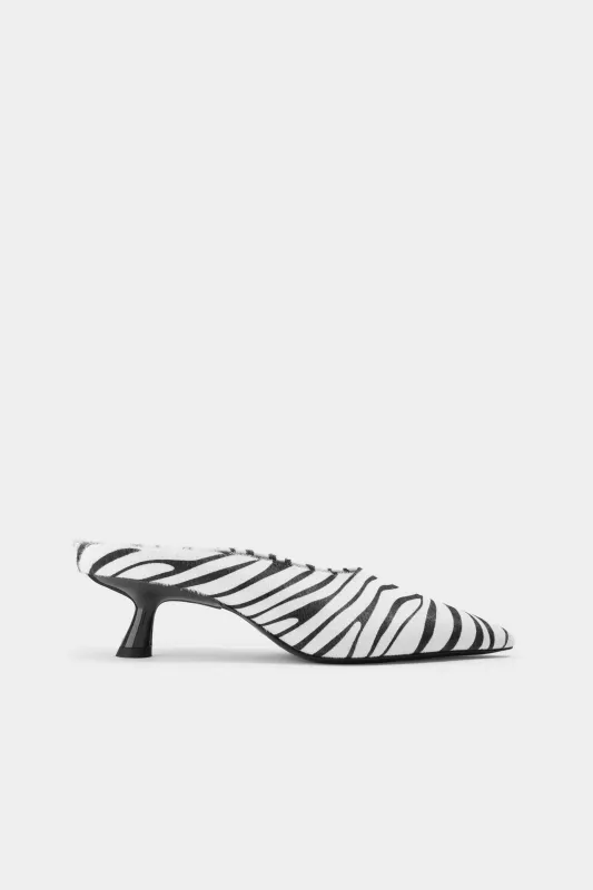 Haircalf Pointed Gala Mule In Zebra sold by Simon Miller
