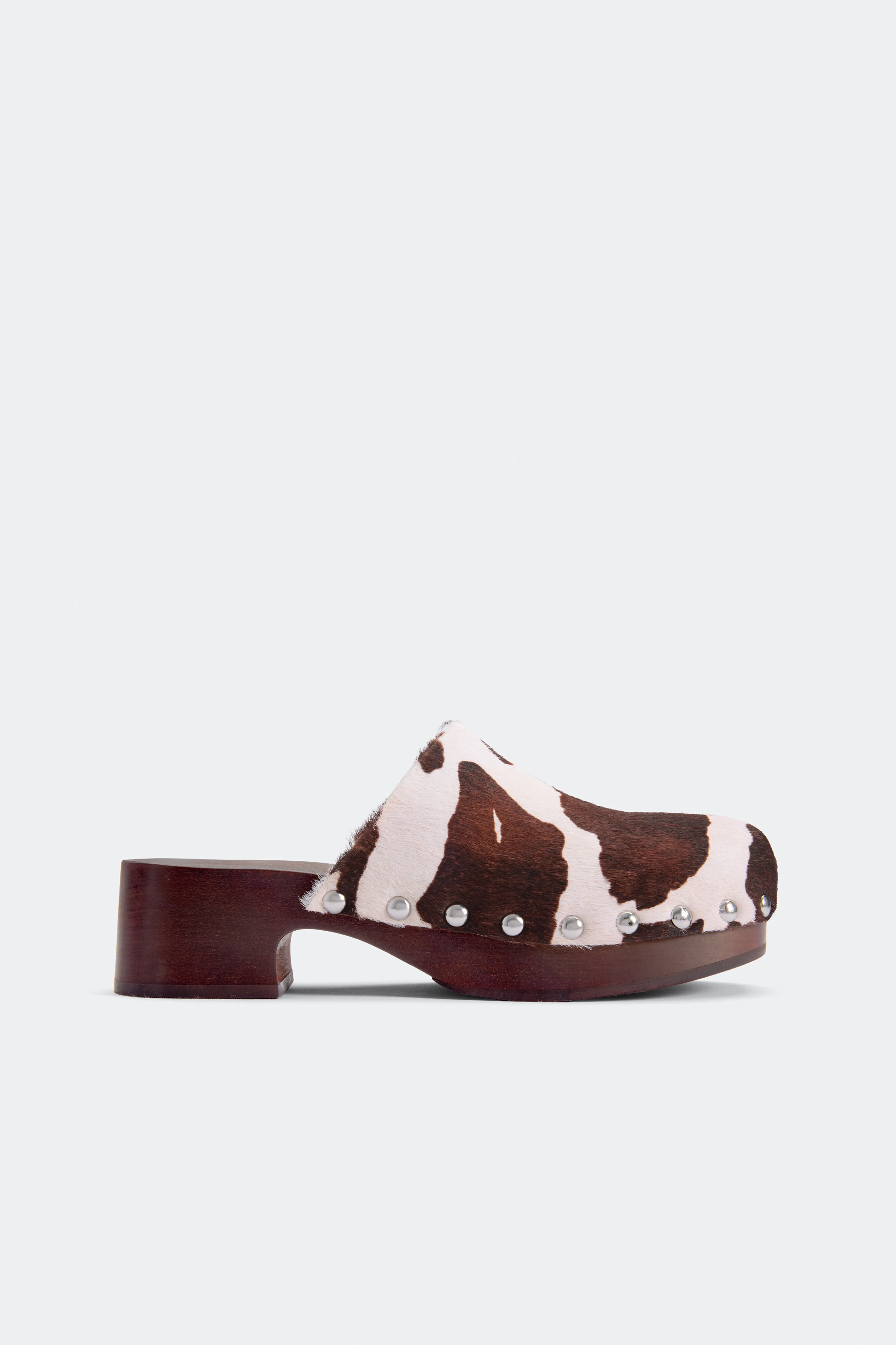 Rio Wood Clog In Cow Print sold by Simon Miller