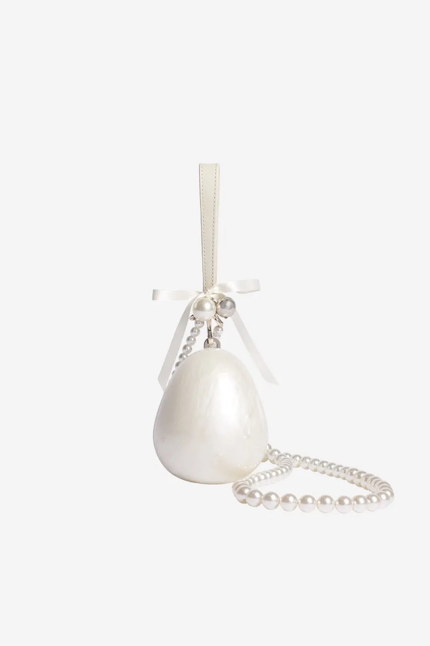 Bell Charm Pearl Egg Bag sold by Simone Rocha