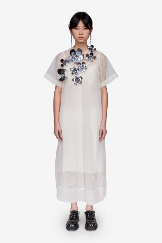 Silver Flower Sequin Apron Dress sold by Simone Rocha