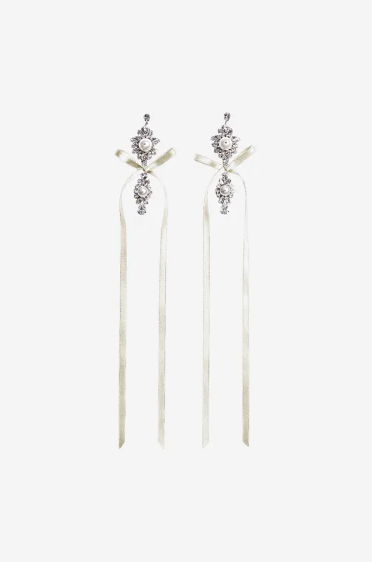Long Crystal Crest Bow Earrings sold by Simone Rocha