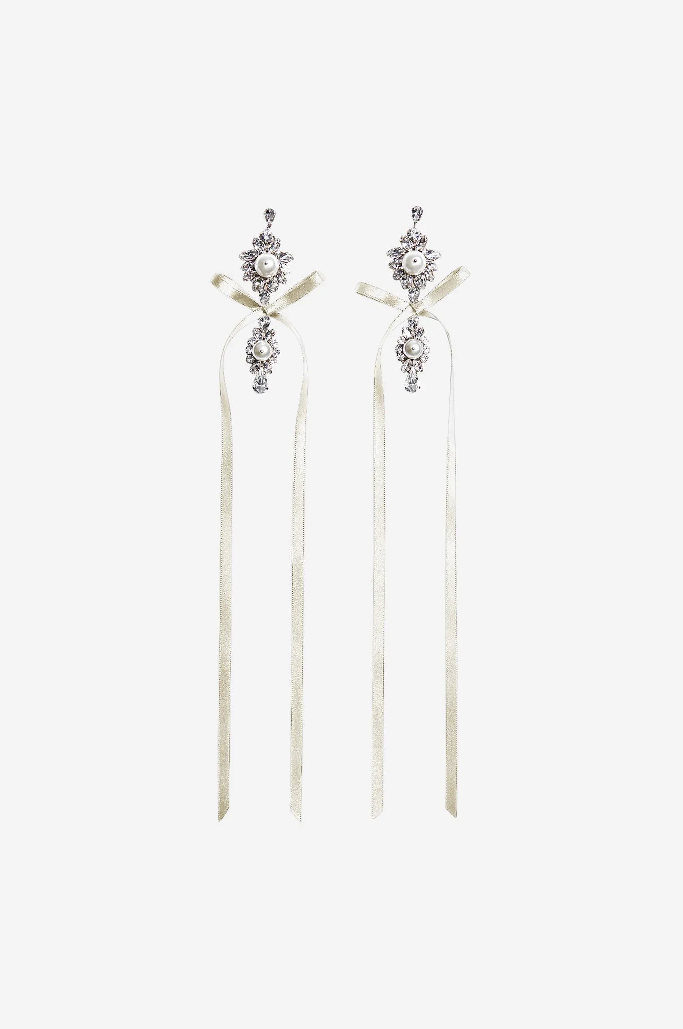 Long Crystal Crest Bow Earrings sold by Simone Rocha