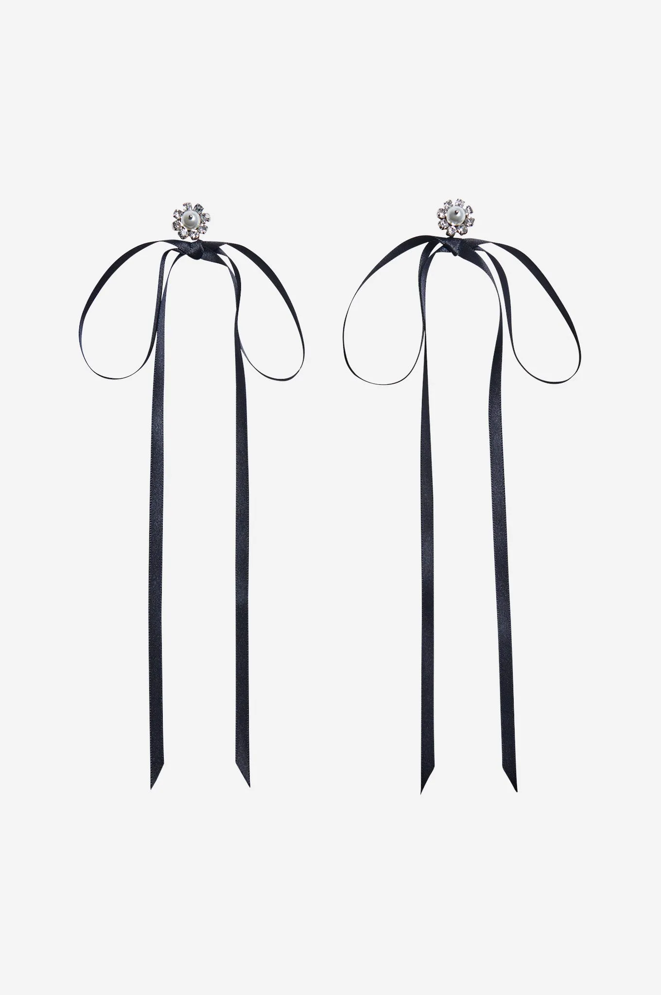 Crystal Daisy Bow Earrings sold by Simone Rocha
